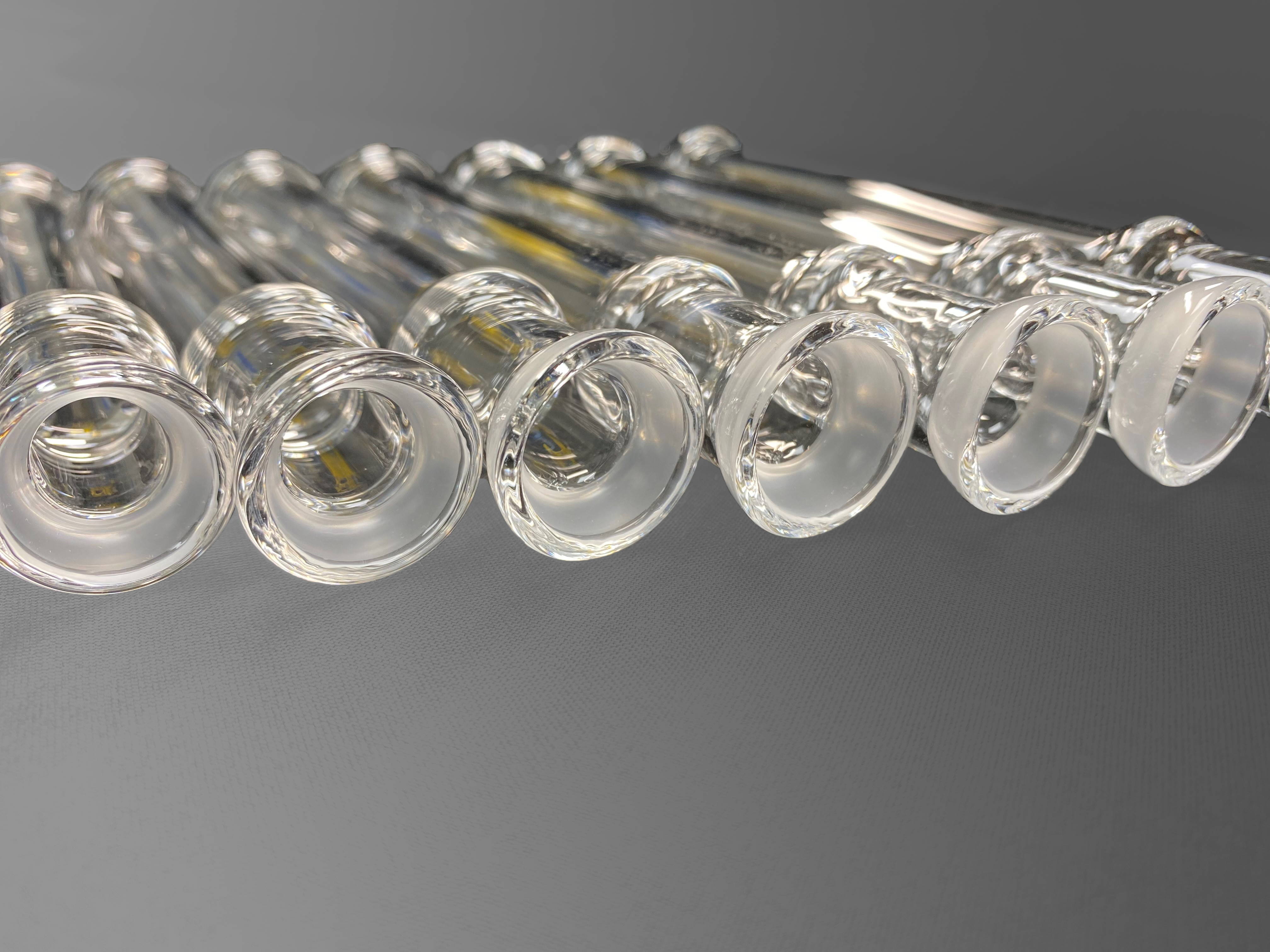 a row of processed glass elements