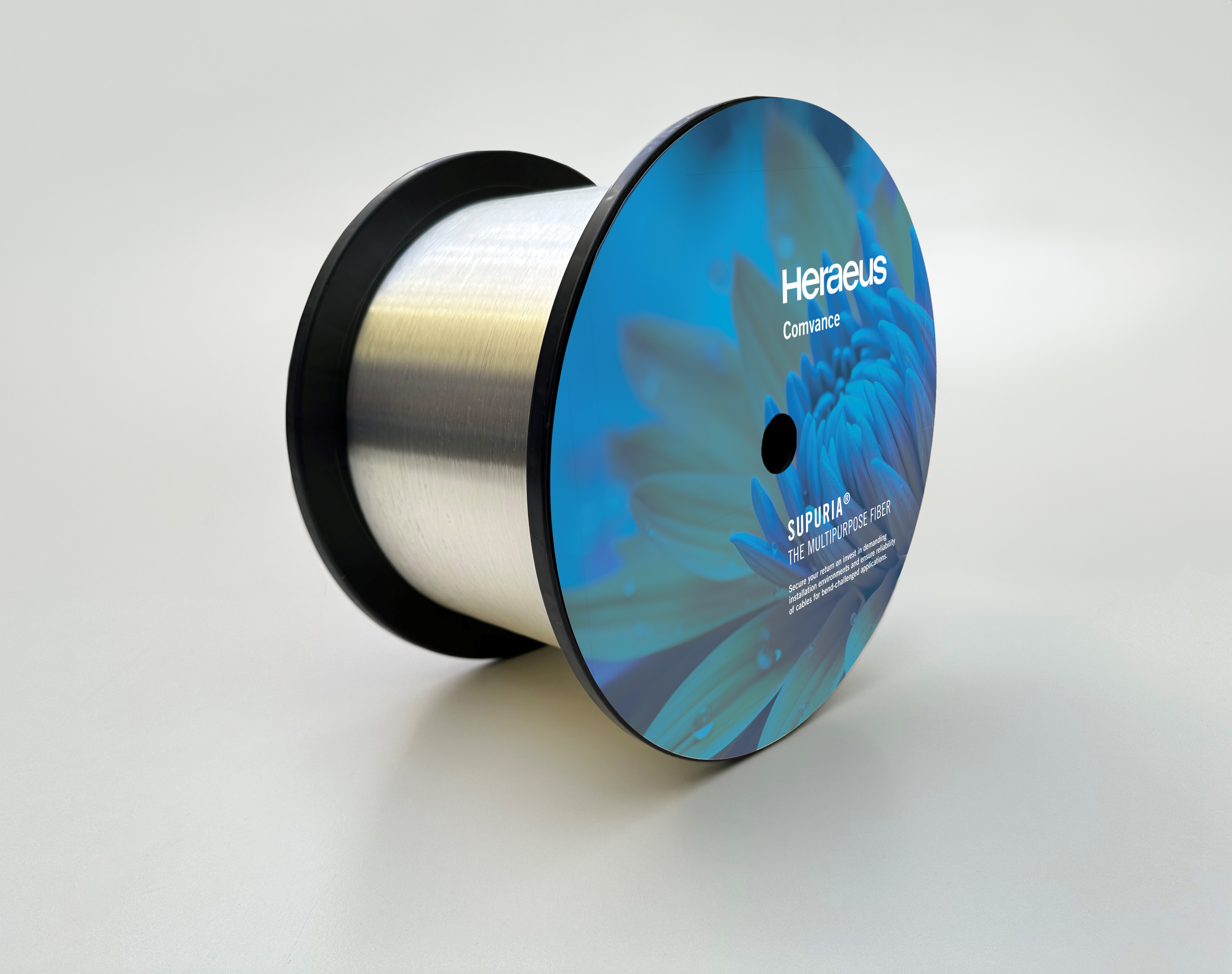 Product image of a fiber optic spool with blue label on a white background