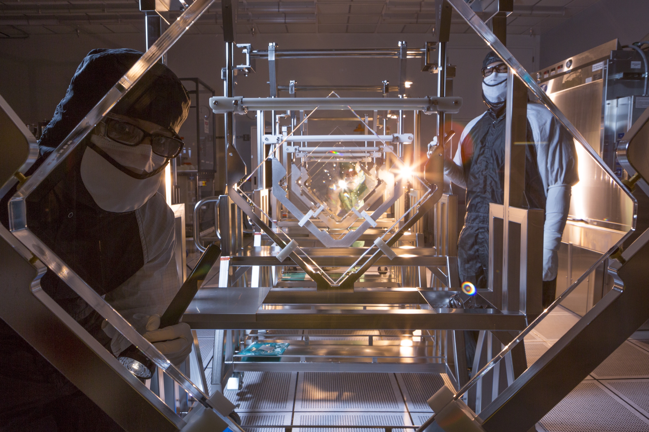 Pictured is the view through a series of high purity laser optics, used at National Ignition Facility.