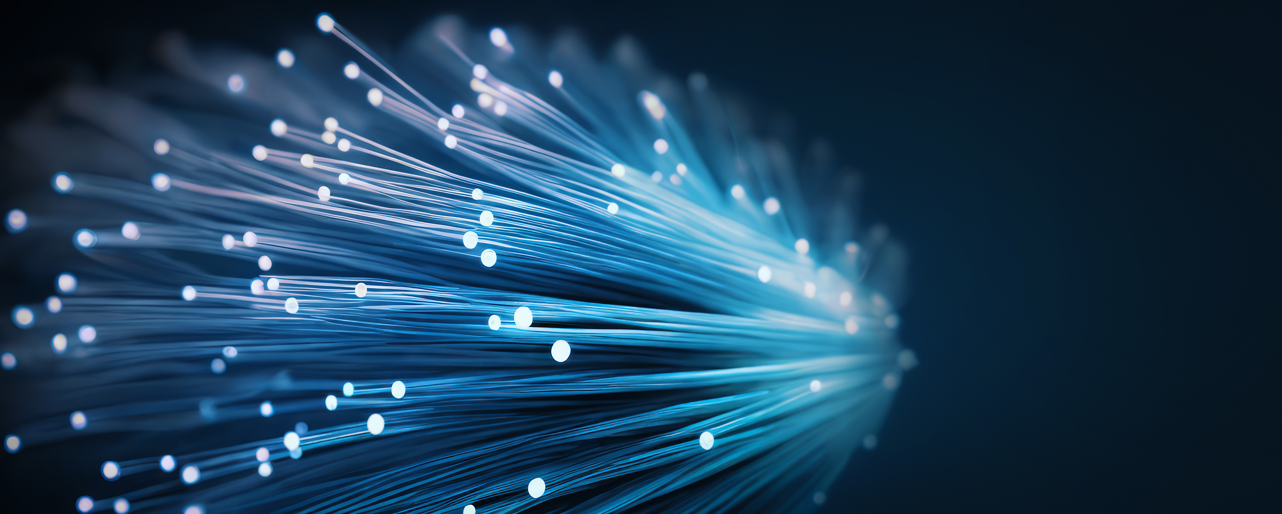 AI generated. A fiber optic bundle, with blue lighting effect onblack background