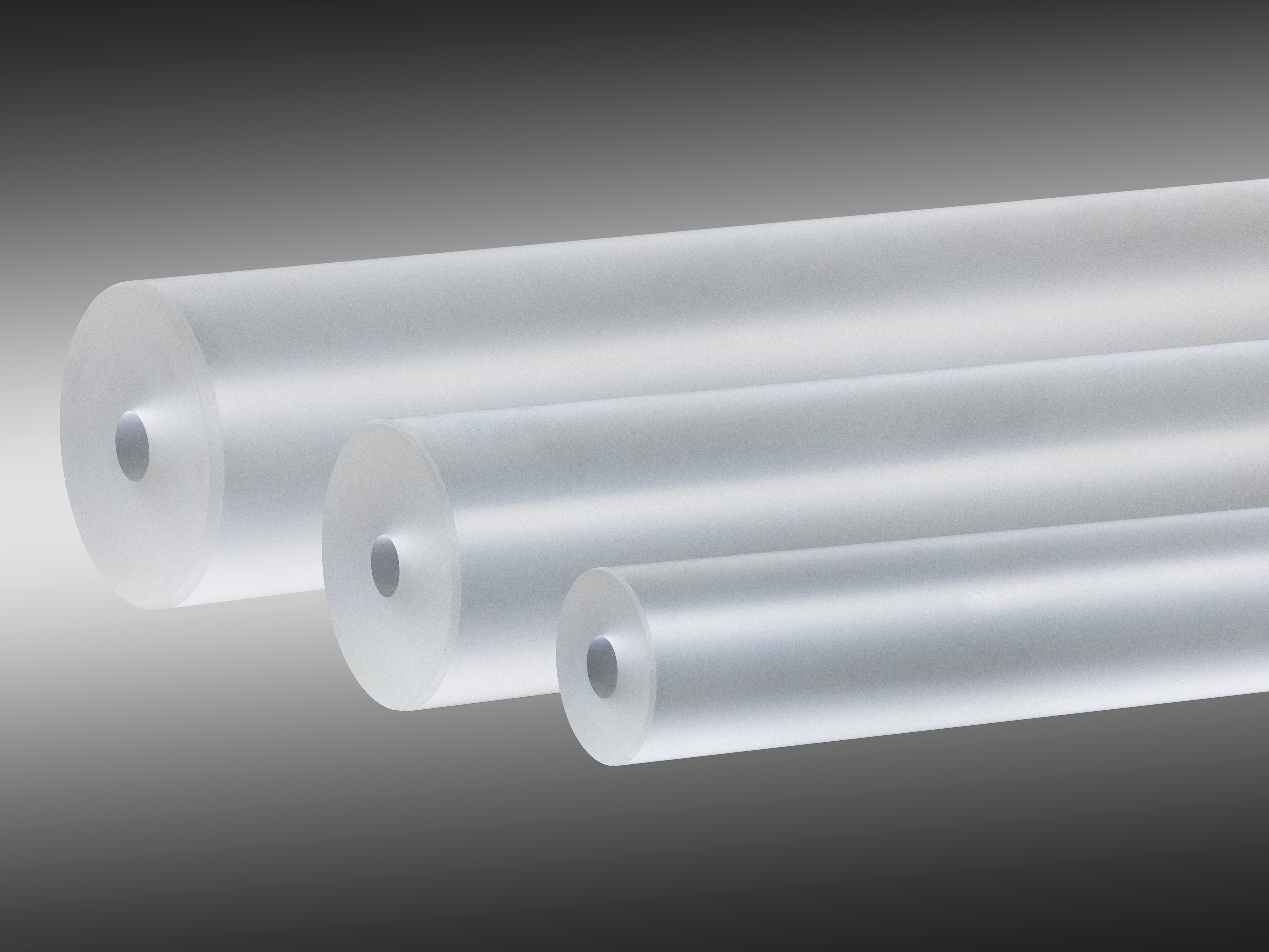Three ric cylinders graphically staged on a black background